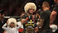 Khabib Nurmagomedov celebrates his victory after his UFC Lightweight Championship match against Dustin Poirier (not seen) at Yas Island in Abu Dhabi, United Arab Emirates on September 6, 2019. Anadolu
