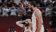 Spain's Marc Gasol and Ricky Rubio react REUTERS/Jason Lee
