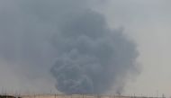 Smoke is seen following a fire at Aramco facility in the eastern city of Abqaiq, Saudi Arabia, September 14, 2019. REUTERS