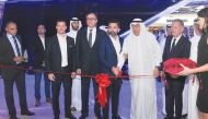 Dr. Hamid Haqparwar (centre), Managing Director of BMW Middle East, and Hussain Ibrahim Alfardan, Chairman of Alfardan Group, cutting the ribbon with other officials, during the opening of the 
BMW M power section and unveiling of new BMW M X4 and M850i 