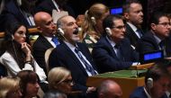 Delegates from Syria listen as US President Donald Trump speaks during the 74th Session of the United Nations General Assembly at UN Headquarters in New York, September 24, 2019. / AFP / SAUL LOEB