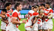 Japan players celebrate victory at the end of the Japan 2019 Rugby World Cup Pool A match between Japan and Ireland at the Shizuoka Stadium Ecopa in Shizuoka on September 28, 2019. / AFP / William WEST