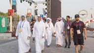 Ooredoo employees heading to Khalifa International Stadium along with Group CEO, Sheikh Saud bin Nasser Al Thani (second left). 