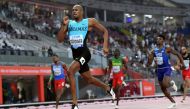 Bahamas' Steven Gardiner (front L) reacts as he crosses the finish line and wins in the Men's 400m final at the 2019 IAAF Athletics World Championships at the Khalifa International stadium in Doha on October 4, 2019. / AFP / Kirill KUDRYAVTSEV