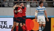 England's wing Jack Nowell (L) celebrates his try with team-mates during the Japan 2019 Rugby World Cup Pool C match between England and Argentina at the Tokyo Stadium in Tokyo on October 5, 2019. AFP / CHARLY TRIBALLEAU