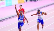 Noah Lyles celebrates as USA win the men's 4x100m relay final at the 2019 IAAF Athletics World Championships yesterday.