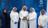 Nasser Al Khater (centre), CEO, FIFA World Cup Qatar 2022 LLC, and Dr Yousef Ali Al Kathim (second right), President of the Arab Federation for Voluntary Activities (AFVA), with other officials after signing the MoU.