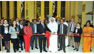 The Chief Executive Officer of Regency Travel and Tours, Tareq Abdullatif Taha, with the Chief Commercial Officer of Qatar Airways, Ehab Amin, inaugurating the new branch of Regency at Al Asmakh Tower, West Bay, on Monday. Pic: Salim Matramkot / The Penin