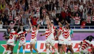 Japan's Kenki Fukuoka and team mates celebrate at the end of the match. (REUTERS/Matthew Childs)