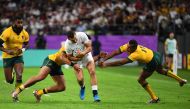 England's wing Jonny May (C) is tackled by Australia's centre Jordan Petaia (2nd L) and Australia's full back Kurtley Beale during the Japan 2019 Rugby World Cup quarter-final match between England and Australia at the Oita Stadium in Oita on October 19, 