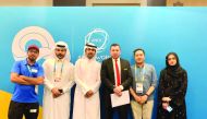 The participants in the ANOC World Beach Games with the representatives of Ezdan Hotel West Bay during the honouring ceremony. 
