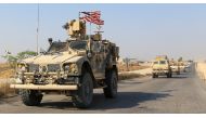 A convoy of U.S. vehicles is seen after withdrawing from northern Syria, on the outskirts of Dohuk, Iraq, October 21, 2019. REUTERS/Ari Jalal