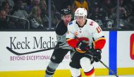 Los Angeles Kings center Jeff Carter (77) chases Calgary Flames center Mikael Backlund (11) in the first period at Staples Center. Credit: Jayne Kamin-Oncea-USA TODAY Sports 