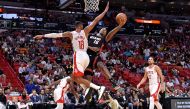 Miami Heat forward James Johnson (16) shoots defended by Houston Rockets forward Thabo Sefolosha (18) during the second half at American Airlines Arena. Mandatory Credit: Steve Mitchell-USA TODAY Sports