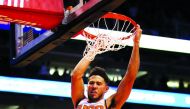  Devin Booker #1 of the Phoenix Suns slam dunks the ball against the Philadelphia 76ers during the second half of the NBA game at Talking Stick Resort Arena on November 04, 2019 in Phoenix, Arizona. Christian Petersen/Getty Images/AFP