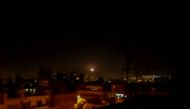 Light in the sky, believed to be a missile, is seen the city in Damascus, Syria November 20, 2019. REUTERS/Firas Makdesi