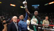 WBC heavyweight champion Deontay Wilder poses with referee Kenny Bayless after defeating Luis Ortiz in their title fight at MGM Grand Garden Arena on November 23, 2019, in Las Vegas, Nevada. Steve Marcus/Getty Images/AFP