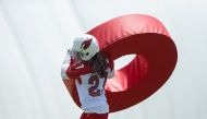 Jun 11, 2019; Tempe, AZ, USA; Arizona Cardinals defensive back Josh Shaw (27) does tackling drills with a roll tackle ring during minicamp at the teams Tempe training facility. Mark J. Rebilas-USA TODAY Sports/File Photo
 