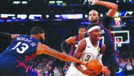 Indiana Pacers guard Aaron Holiday (3) drives to the basket against New York Knicks forward Marcus Morris Sr. (13) and forward Taj Gibson (67) during the first half at Madison Square Garden. Credit: Noah K. Murray-USA TODAY Sports
