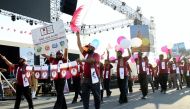 A file picture of a parade organised as part of the National Day celebrations by the expatriate communities at Asian Town. 