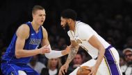 December 29, 2019; Los Angeles, California, USA; Los Angeles Lakers forward Anthony Davis (3) moves the ball against Dallas Mavericks forward Kristaps Porzingis (6) during the first half at Staples Center. Mandatory Credit: Gary A. Vasquez-USA TODAY Sport