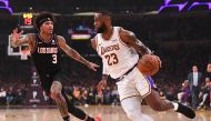 Phoenix Suns forward Kelly Oubre Jr. (3) guards Los Angeles Lakers forward LeBron James (23) as he drives to the basket in the first half of the game at Staples Center. Jayne Kamin