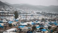 FILE PHOTO: A view of tents at a camp for displaced Syrians at Khirbet al-Joz in the west of the northwestern Idlib province near the border with Turkey, where residents survive mostly on aid and barely have enough money to buy food and clothes to keep wa