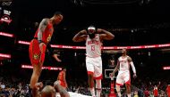 PJ Tucker #17 of the Houston Rockets reacts towards James Harden #13 after drawing a charge from Alex Len #25 of the Atlanta Hawks to force a turnover in the second half at State Farm Arena on January 08, 2020 in Atlanta, Georgia.  Kevin C. Cox/ AFP
