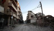 Damaged buildings that were hit during recent airstrikes by pro-regime forces in the jihadist-held city of Maaret al-Numan in Syria's northwestern Idlib province are pictured on January 25, 2020. AFP / Omar HAJ KADOUR