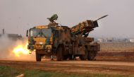 A Turkish military mobile rocket launcher fires from a position near the village of Miznaz, on the eastern outskirts of Syria's Aleppo province, on February 14, 2020, at Syrian government forces' positions in the countryside of Aleppo province. / AFP / AA