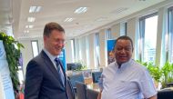 Russian Energy Minister Alexander Novak and OPEC's Secretary General Mohammad Barkindo perform a 