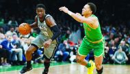 Brooklyn Nets guard Caris LeVert (22) drives against Boston Celtics point guard Carsen Edwards (4) during overtime at TD Garden. Credit: Greg M. Cooper-USA TODAY Sports