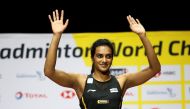 File Photo: 2019 Badminton World Championships - St. Jakobshalle Basel, Basel, Switzerland - August 25, 2019 India's Pusarla Sindhu celebrates on the podium after winning the women's singles final. REUTERS/Vincent Kessler