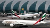 FILE PHOTO: Emirates Boeing 777-300ER planes at Dubai International Airport in Dubai, United Arab Emirates, February 15, 2019. REUTERS/Christopher Pike