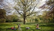 People relax in St James's Park, as the spread of the coronavirus disease (COVID-19) continues, London, Britain, April 12, 2020. REUTERS/Henry Nicholls