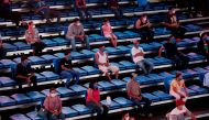 Fans wearing protective face masks are seated with social distancing during a boxing match in Managua, Nicaragua. (REUTERS/Oswaldo Rivas )