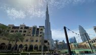 People walk outside Dubai mall after the UAE government eased a curfew and allowed stores to open, following the outbreak of the coronavirus disease (COVID-19) in Dubai, United Arab Emirates May 3, 2020. REUTERS/Abdel Hadi Ramahi