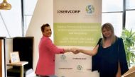 Fabienne Moukheiber Hajjar (left), Senior Manager of Servcorp, and Catina Aghayan, Communication Adviser of Elite Paper Recycling (EPR), after signing the MoU.