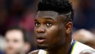 In this file photo taken on February 23, 2020, Zion Williamson of the New Orleans Pelicans sits on the bench during their game against the Golden State Warriors in San Francisco, California. Ezra Shaw/Getty Images/AFP