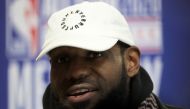 In this file photo LeBron James of the Los Angeles Lakers speaks to the media during 2020 NBA All-Star - Practice & Media Day at Wintrust Arena on February 15, 2020 in Chicago, Illinois. A rare James trading card from his rookie season in the NBA with the