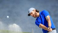 In this file photo taken on February 25, 2020, Tommy Fleetwood of England hits a shot during a practice round prior to the Honda Classic at PGA National Resort and Spa in Palm Beach Gardens, Florida.  / AFP / GETTY IMAGES NORTH AMERICA / SAM GREENWOOD