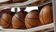 In this file photo taken on July 05, 2019 Basketballs are shown in a ball rack before a game between the Washington Wizards and the New Orleans Pelicans during the 2019 NBA Summer League at the Thomas & Mack Center on in Las Vegas, Nevada.  / AFP / GETTY 