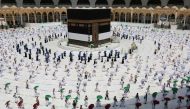 Pilgrims circumambulating around the Kaaba, Islam's holiest shrine, at the centre of the Grand Mosque in the holy city of Mecca, at the start of the annual Muslim Hajj pilgrimage. AFP 