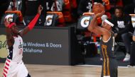 Aug 9, 2020; Lake Buena Vista, Florida, USA; Oklahoma City Thunder forward Darius Bazley (7) makes a three point basket against Washington Wizards forward Isaac Bonga (17) during the first half of a NBA basketball game at AdventHealth Arena. Mandatory Cre