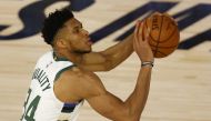 Giannis Antetokounmpo #34 of the Milwaukee Bucks shoots against the Orlando Magic in Game Three of the Eastern Conference First Round during the 2020 NBA Playoffs at The Field House at ESPN Wide World Of Sports Complex on August 22, 2020 in Lake Buena Vis