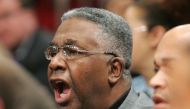 In this file photo former head coach John Thompson II of the Georgetown Hoyas shouts from the stands as his former team takes on the Connecticut Huskies during the quaterfinal round of the Big East Men's Basketball Championship on March 10, 2005 at Madiso