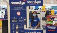 An information desk for Scan&Go Mobile service at one of Carrefour Qatar outlets.