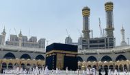 Saudis and foreign residents circumambulate (Tawaf) the Kaaba in the Grand Mosque complex in the holy city of Makkah, on October 4, 2020.  AFP / BANDAR AL-DANDANI