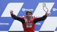 October 11, 2020 Mission Winnow Ducati Corse's Danilo Petrucci celebrates winning the race with the trophy on the podium REUTERS/Stephane Mahe