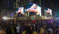 Lakers fans celebrate their team winning the 2020 NBA Championship during the COVID-19 pandemic in Los Angeles, California, U.S., October 11, 2020. REUTERS/Ringo Chiu
